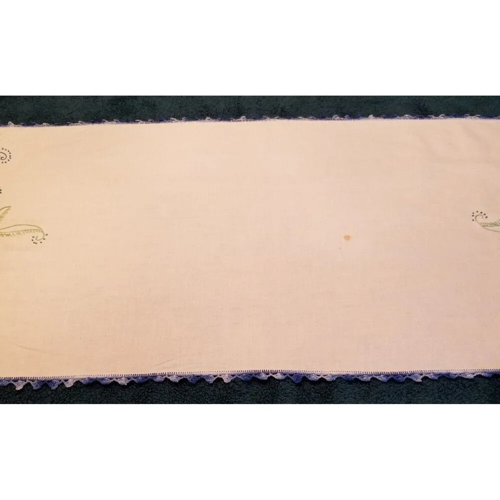 vintage handmade floral needlework table runner with a crocheted border
